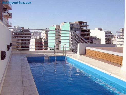 Terrace with outdoor swimming po